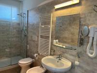 Kúpeľňa v ubytovaní Hotel Riva e Mare