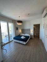 Posteľ alebo postele v izbe v ubytovaní Hotel Riva e Mare