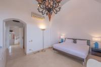 Postel nebo postele na pokoji v ubytování VESTA - El Gouna Residence