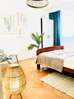 Postel nebo postele na pokoji v ubytování Apartmani-Okrug Gornji-Ciovo