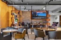 TV a/nebo společenská místnost v ubytování Konvin Hotel by Reykjavik Keflavik Airport