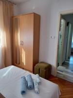 Postel nebo postele na pokoji v ubytování Helen Apartments