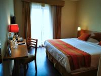 Uma cama ou camas num quarto em Hotel Da Montanha