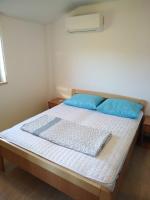 Posteľ alebo postele v izbe v ubytovaní Holiday Home Grimalda