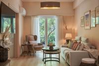 A seating area at Spirou Merkouri Handcrafted 2BD Home