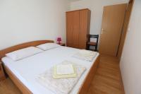 Postel nebo postele na pokoji v ubytování Apartment Davorka