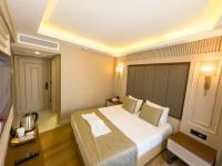 Postel nebo postele na pokoji v ubytování Martinenz Hotel