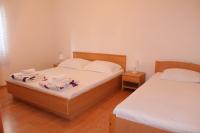 Postel nebo postele na pokoji v ubytování Apartment Davorka