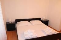 Postel nebo postele na pokoji v ubytování Apartment Davorka