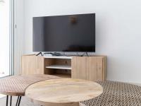 Televízia a/alebo spoločenská miestnosť v ubytovaní Apartment Bahia-14 by Interhome