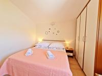 Postel nebo postele na pokoji v ubytování Rooms and Apartments Porat