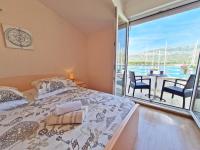 Postel nebo postele na pokoji v ubytování Rooms and Apartments Porat