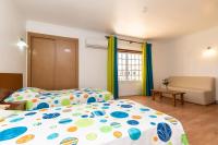 Postel nebo postele na pokoji v ubytování Hotel Azul Praia