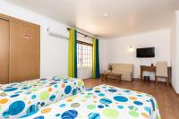 Postel nebo postele na pokoji v ubytování Hotel Azul Praia
