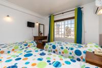 Postel nebo postele na pokoji v ubytování Hotel Azul Praia