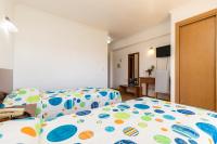 Postel nebo postele na pokoji v ubytování Hotel Azul Praia