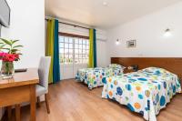 Postel nebo postele na pokoji v ubytování Hotel Azul Praia