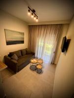 Televízia a/alebo spoločenská miestnosť v ubytovaní Villa Maria apartments