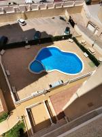 Bazén v ubytování LOMAS DEL MAR TORREVIEJA SOBRE EL MEDITERRÁNEO nebo v jeho okolí