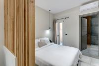 Posteľ alebo postele v izbe v ubytovaní Argento urban apartments (cube)