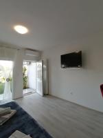 Televízia a/alebo spoločenská miestnosť v ubytovaní Leona apartment Vidikovac, Pula