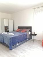 Posteľ alebo postele v izbe v ubytovaní Leona apartment Vidikovac, Pula