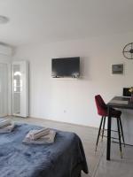Televízia a/alebo spoločenská miestnosť v ubytovaní Leona apartment Vidikovac, Pula