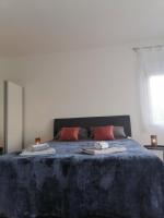 Posteľ alebo postele v izbe v ubytovaní Leona apartment Vidikovac, Pula