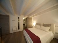 Łóżko lub łóżka w pokoju w obiekcie Tabula Maris B&B