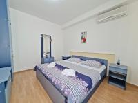 Postel nebo postele na pokoji v ubytování Rooms and Apartments Porat