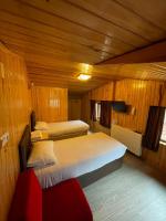 A bed or beds in a room at Ozkan Otel