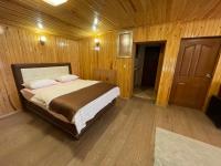 A bed or beds in a room at Ozkan Otel