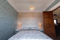 Posteľ alebo postele v izbe v ubytovaní Superbe maison avec piscine et jacuzzi dans les dunes