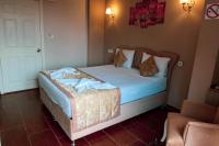 Postel nebo postele na pokoji v ubytování Ağva Carpediem Otel