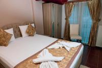 Postel nebo postele na pokoji v ubytování Ağva Carpediem Otel