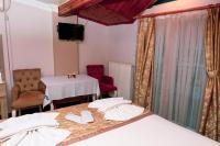 Postel nebo postele na pokoji v ubytování Ağva Carpediem Otel