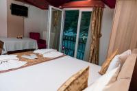 Postel nebo postele na pokoji v ubytování Ağva Carpediem Otel