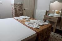 Postel nebo postele na pokoji v ubytování Ağva Carpediem Otel