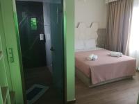 Posteľ alebo postele v izbe v ubytovaní Amalia Deluxe Villas