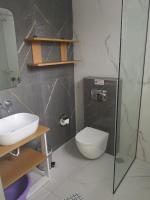 Kúpeľňa v ubytovaní Amalia Deluxe Villas