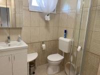 Łazienka w obiekcie Dodi Apartman