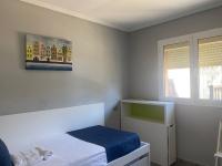 Postel nebo postele na pokoji v ubytování Villa Holiday World