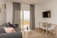 Televízia a/alebo spoločenská miestnosť v ubytovaní Allview apartments