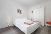 Posteľ alebo postele v izbe v ubytovaní Apartment M&J Supetar