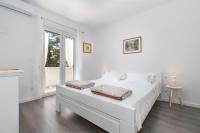 Posteľ alebo postele v izbe v ubytovaní Apartment M&J Supetar
