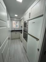 Kuchyň nebo kuchyňský kout v ubytování Precioso apartamento de lujo en cullera