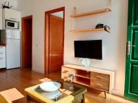 TV a/nebo společenská místnost v ubytování Apartamento El Islote direct at Paradise Beach