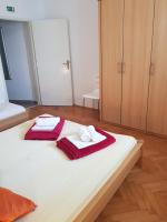 Posteľ alebo postele v izbe v ubytovaní Apartments Joko
