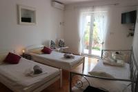 Posteľ alebo postele v izbe v ubytovaní Apartments Joko