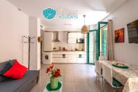 A kitchen or kitchenette at SkySea Holidays CITY CENTER SUITES